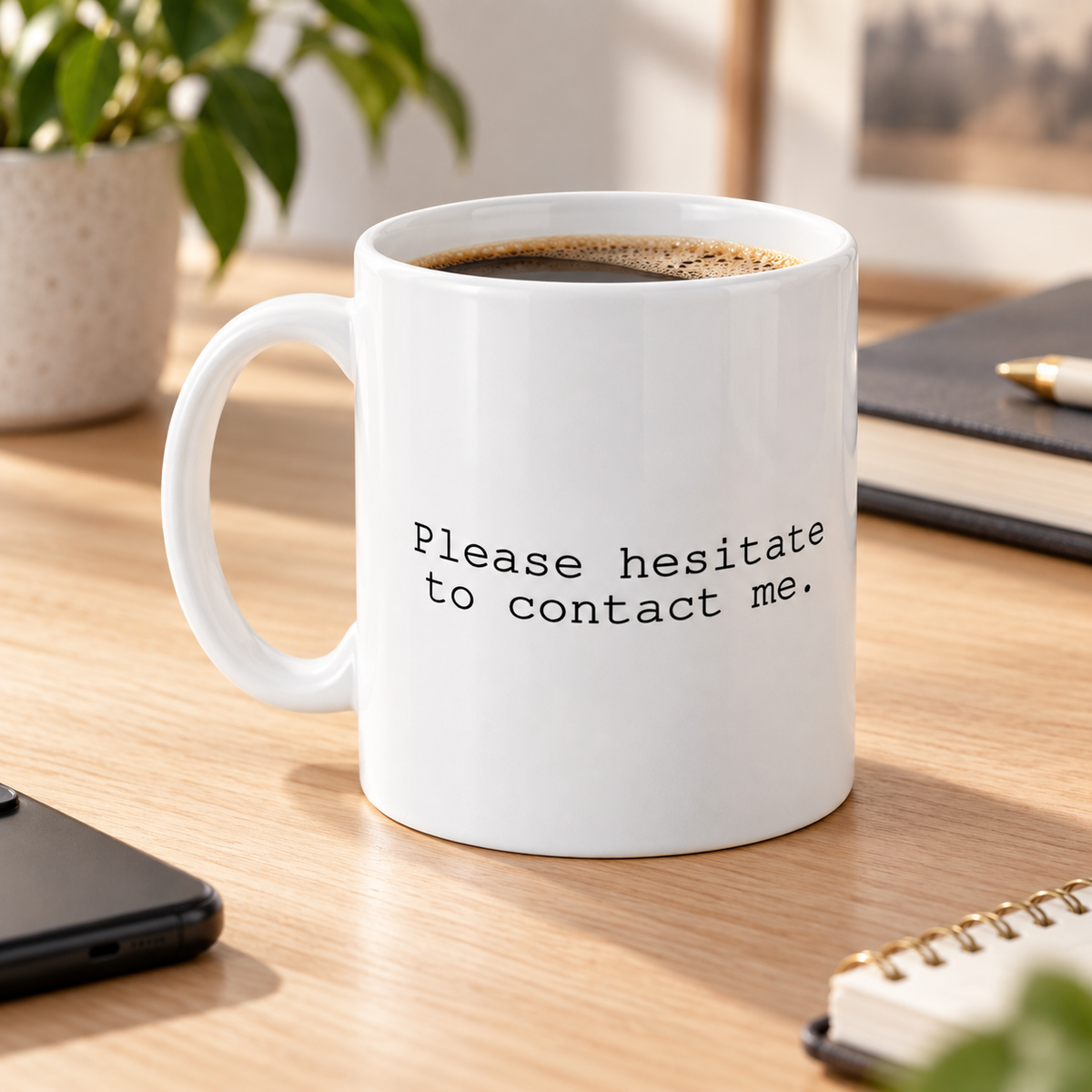Please Hesitate to Contact Me Funny Office Mug in a styled lifestyle setting