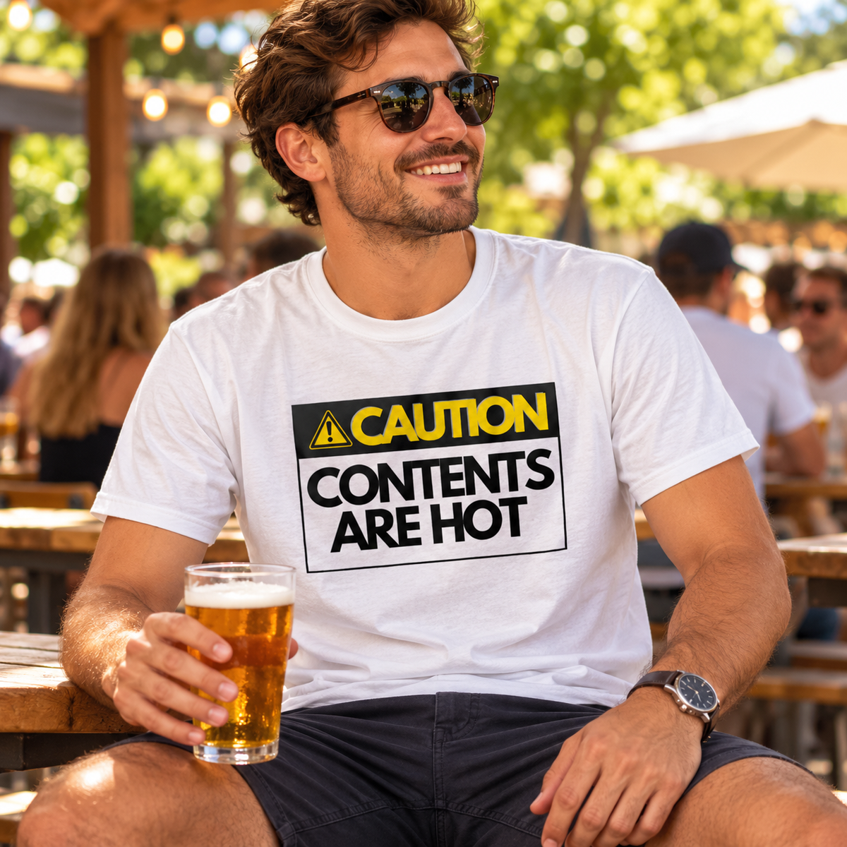 Man wearing White Hot Contents men's T-shirt with caution graphic