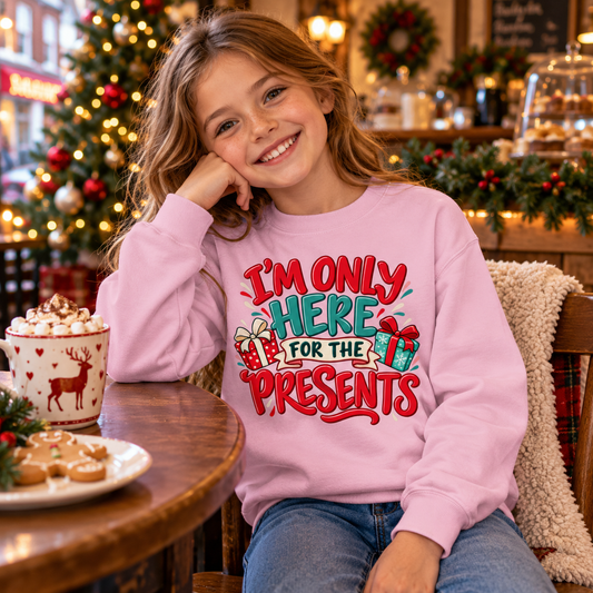 I'm Only Here For The Presents in Baby Pink – festive lifestyle photo