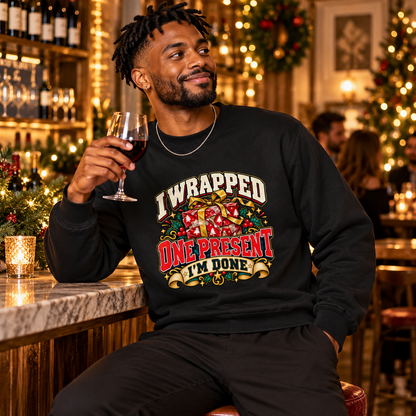 I Wrapped One Present Mens Christmas Jumper in Jet Black – men's Christmas sweatshirt lifestyle photo