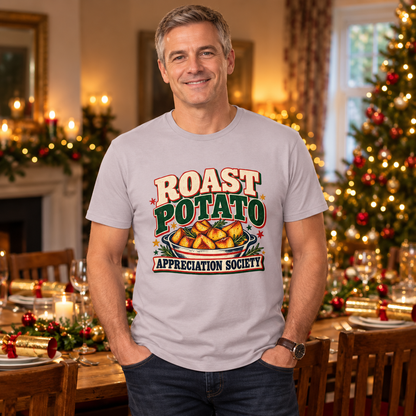 Man wearing Roast Potato Appreciation Society Men's Christmas T-Shirt in Ice Grey in a festive lifestyle setting