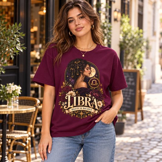 Libra Beauty in Balance Women's T-Shirt – Burgundy in Maroon, worn by a woman in a lifestyle setting