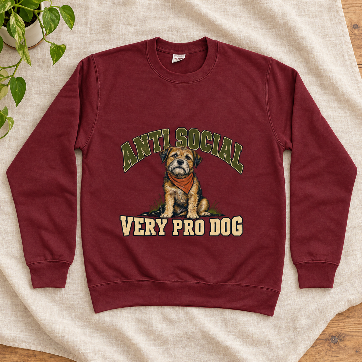 Anti Social, Very Pro Dog Women’s Sweatshirt in Burgundy, front artwork flat lay