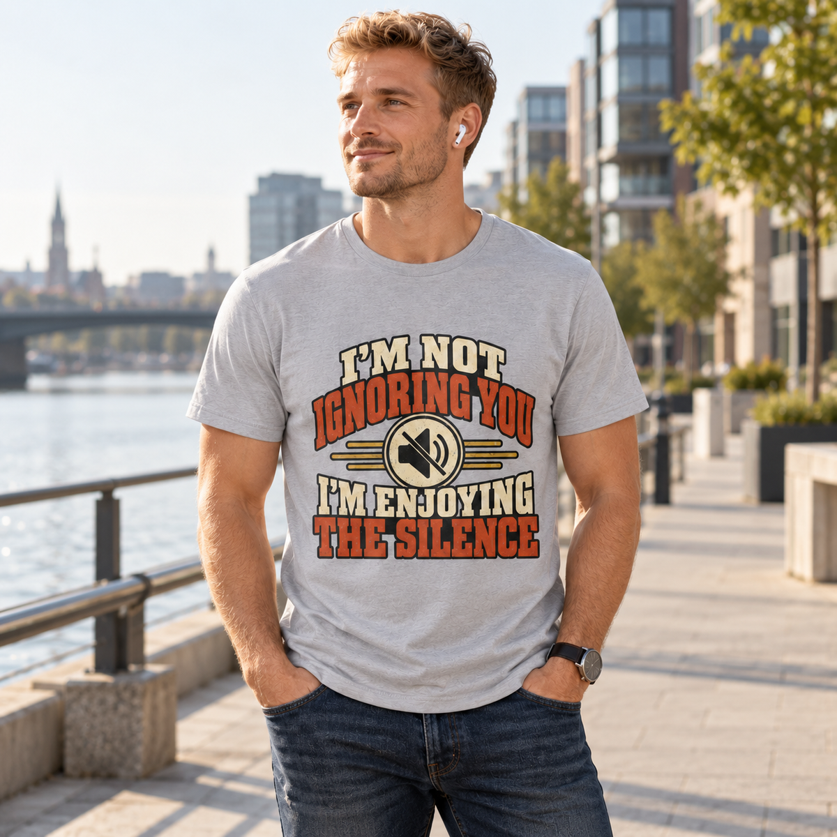 Man wearing Sports Grey I’m Not Ignoring You I’m Enjoying the Silence T-shirt beside a river