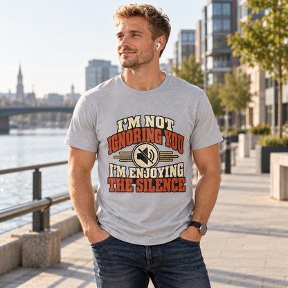 Man wearing Sports Grey I’m Not Ignoring You I’m Enjoying the Silence T-shirt beside a river