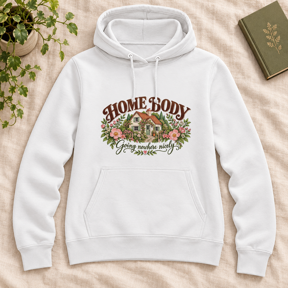 Home Body Going Nowhere Nicely Women’s Hoodie in Arctic White, front artwork flat lay