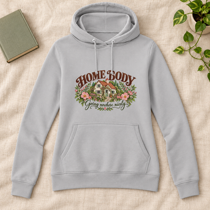 Home Body Going Nowhere Nicely Women’s Hoodie in Heather Grey, front artwork flat lay