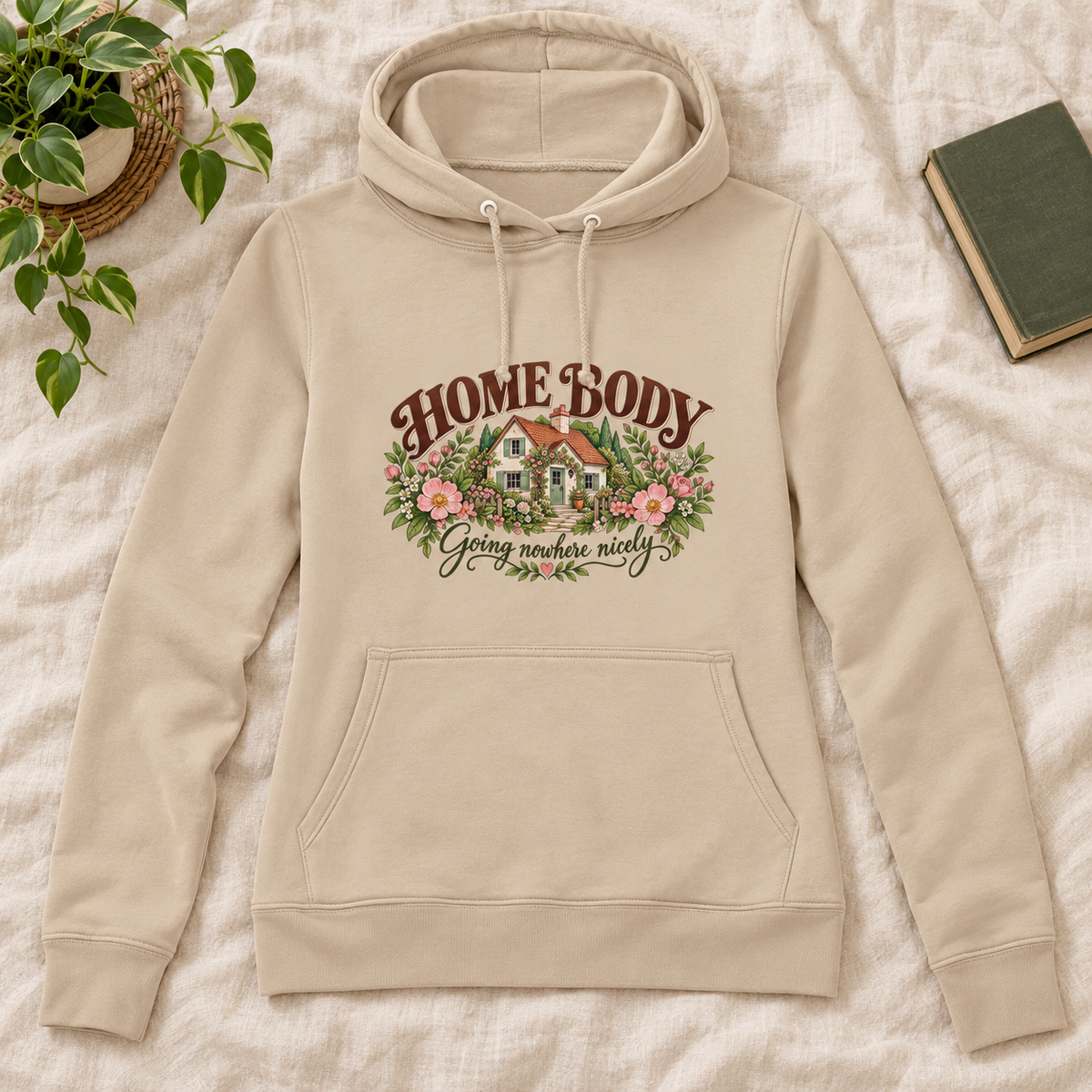 Home Body Going Nowhere Nicely Women’s Hoodie in Nude, front artwork flat lay