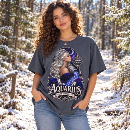 Aquarius Born Different Women's T-Shirt – Dark Colours, model wearing the original design in a sunny frosty woodland path outdoors.