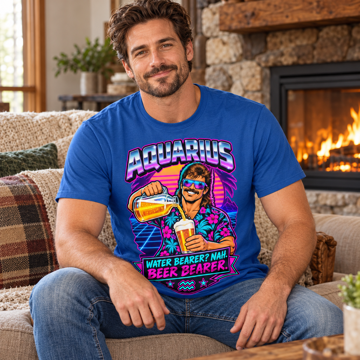 Aquarius Water Bearer? Nah. Beer Bearer Men's T-Shirt, model wearing the original design in a seated comfortably on a cottage sofa beside a fireplace indoors.