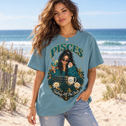 Pisces Feeling All the Feels Women's T-Shirt – Dark in Stone Blue, model at a sandy beach with sea and dunes