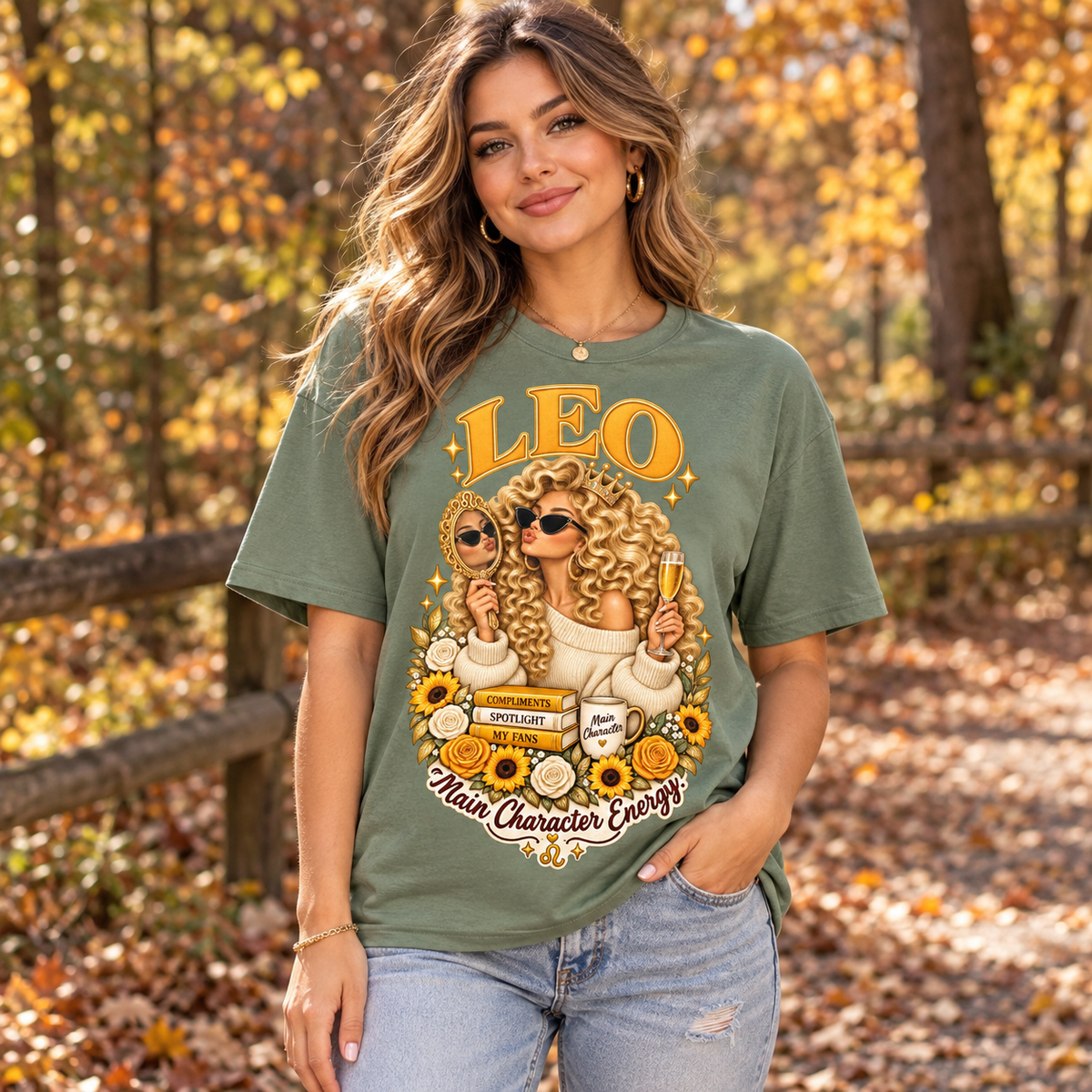 Leo Main Character Energy Women's T-Shirt – Light in Sage, model outdoors in an autumn woodland park