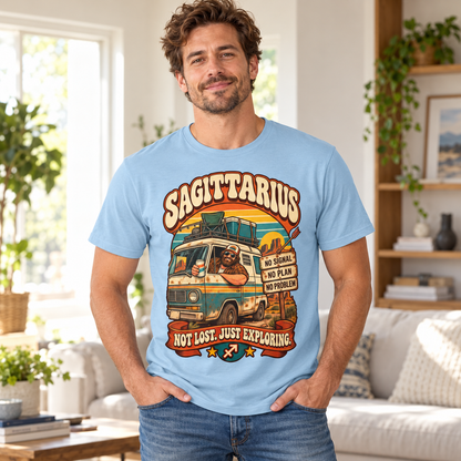Sagittarius Not Lost Just Exploring Men's T-Shirt in Light Blue, model indoors in a bright stylish living room