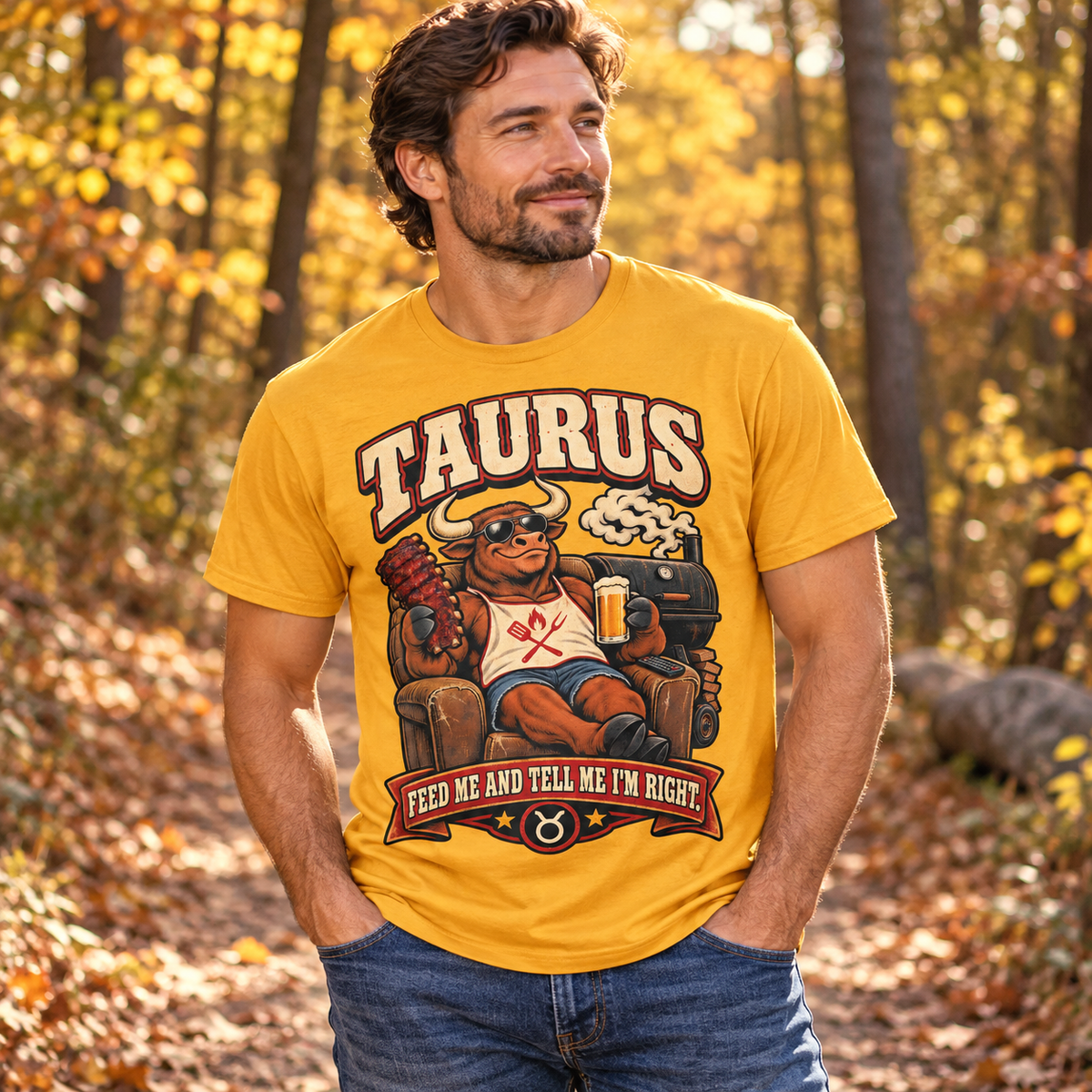 Taurus Feed Me and Tell Me I'm Right Men's T-Shirt in Gold, model on an autumn woodland path with golden foliage