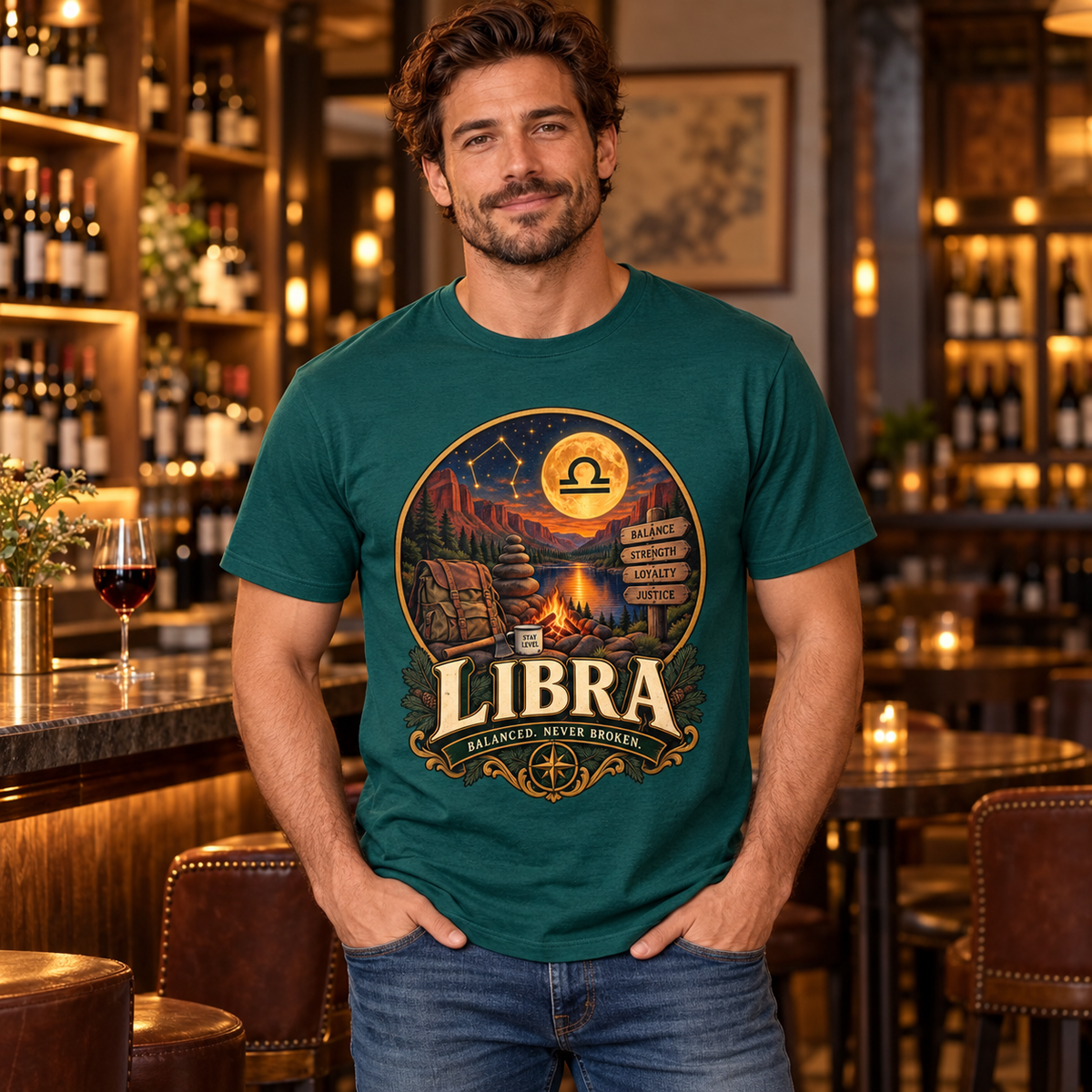 Libra Balanced Never Broken Men's T-Shirt in Fan Marine Green, model indoors in a classy wine bar