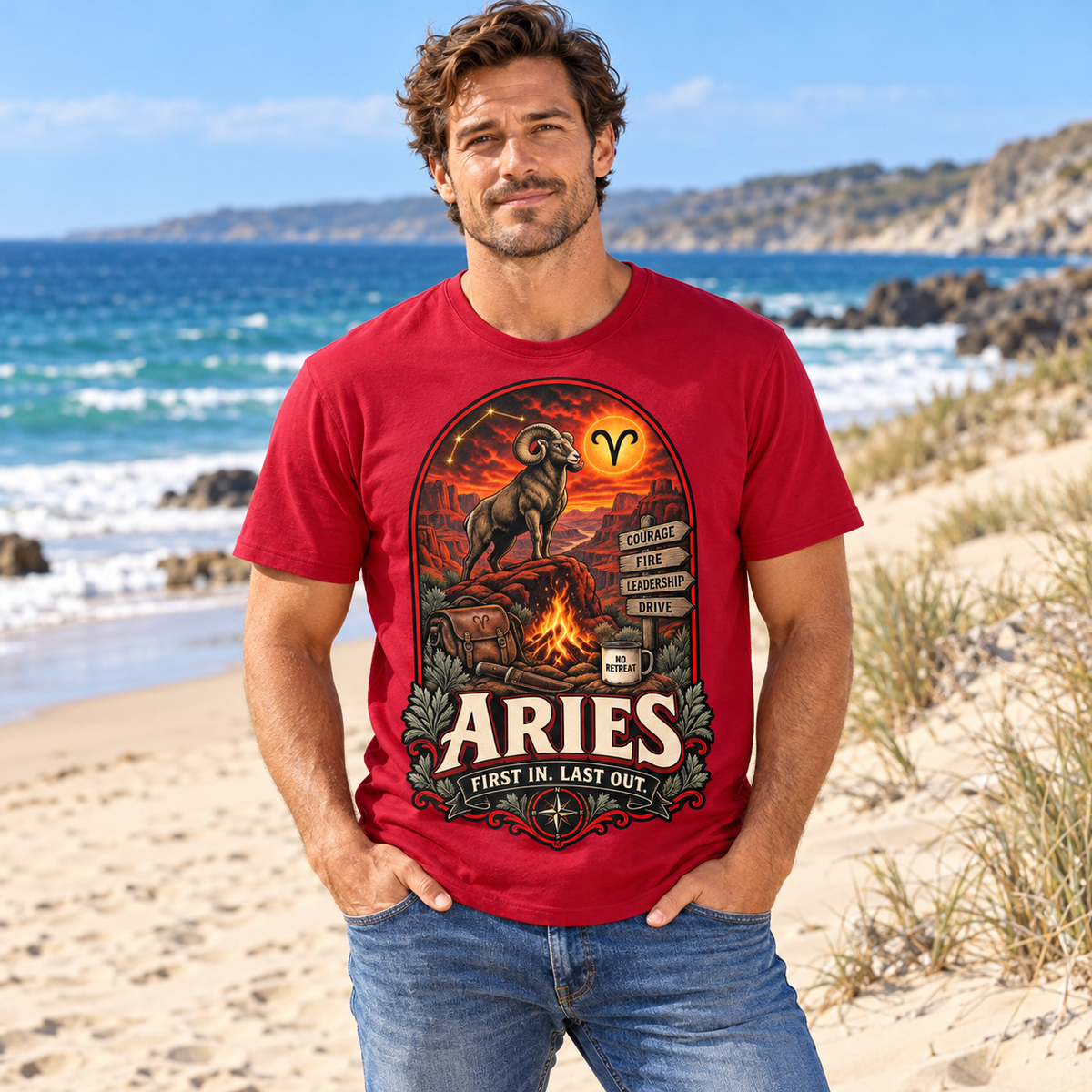 Aries First In Last Out Men's T-Shirt, model wearing the original design in a sandy beach beside blue sea and dunes.