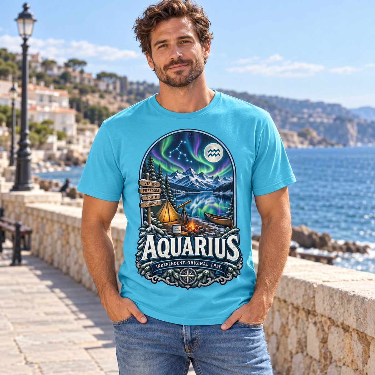 Aquarius Independent Original Free Men's T-Shirt, model wearing the original design in a seaside promenade outdoors.