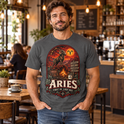 Aries First In Last Out Men's T-Shirt, model wearing the original design in a cosy stylish coffee shop indoors.