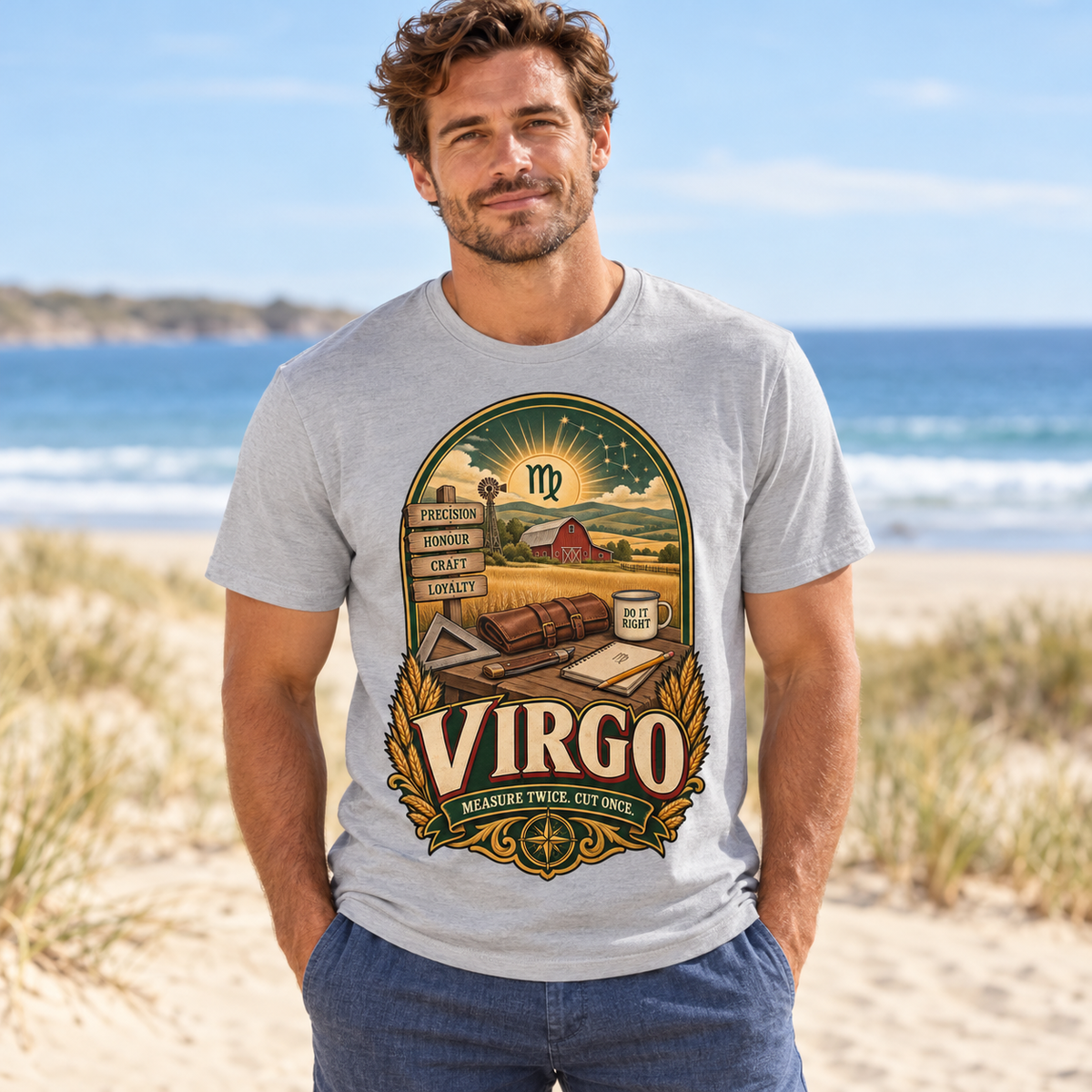 Virgo Measure Twice Men's T-Shirt in Sports Grey, model on a beach beside the sea