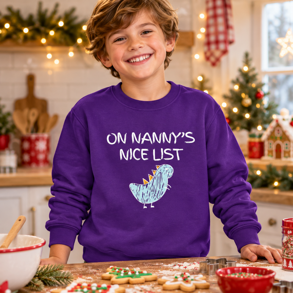 Child wearing Purple On Nanny's Nice List dinosaur Christmas jumper